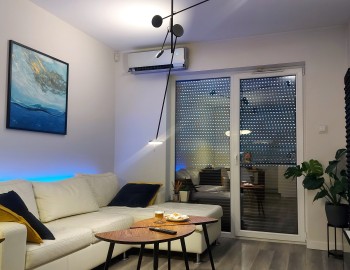 Showroom řízený Tecomat Foxtrotem - vzorové apartmány Września, Polsko